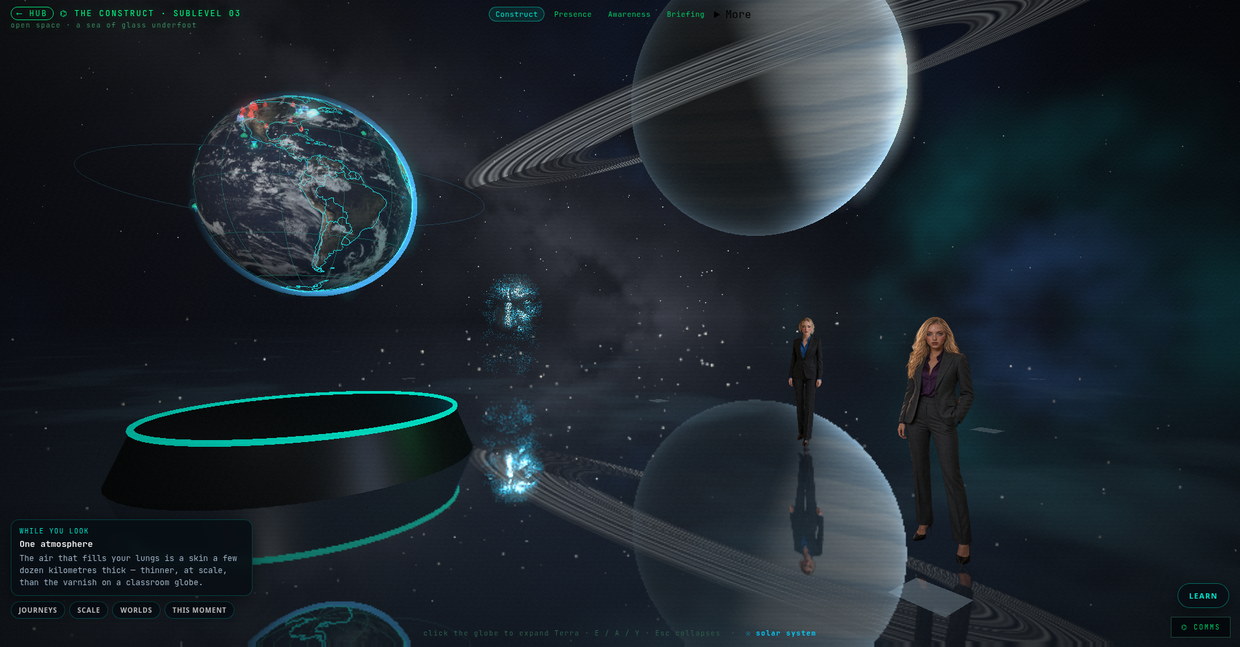 Inside The Construct in open space over a sea of glass, seen at standing eye height from the right of the room: the living Earth above the holotable on the left, Raven's face in blue-white points beyond it at his station, Trinity standing in HD on the glass floor at the centre, and Zara standing in HD nearest on the right, each in a dark suit, a ringed planet beyond.